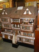 A fantastic Tudor style dolls house complete with furniture. 150 cm wide x 180 cm High, Collect