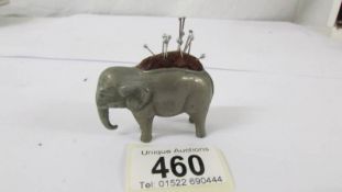 A 19th century metal elephant pin cushion.