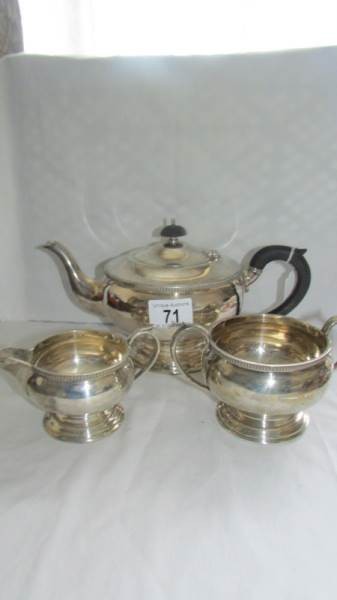 A three piece hall marked tea service, total weight 1000 grams.