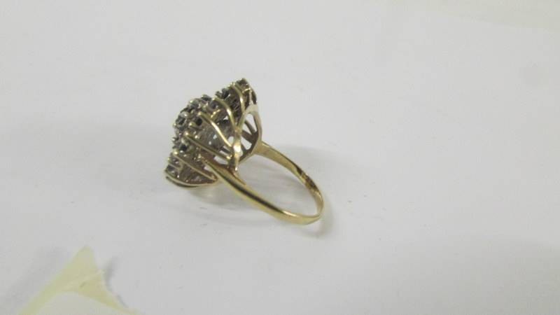 A large yellow gold sapphire and diamond ring, size O. - Image 4 of 6