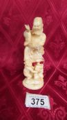 An antique carved ivory figure, a/f (cracks). Available for UK shipping only.