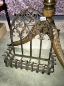 A wrought iron plant wall shelf with gothic arch backing, 48cm x 50cm x 19cm