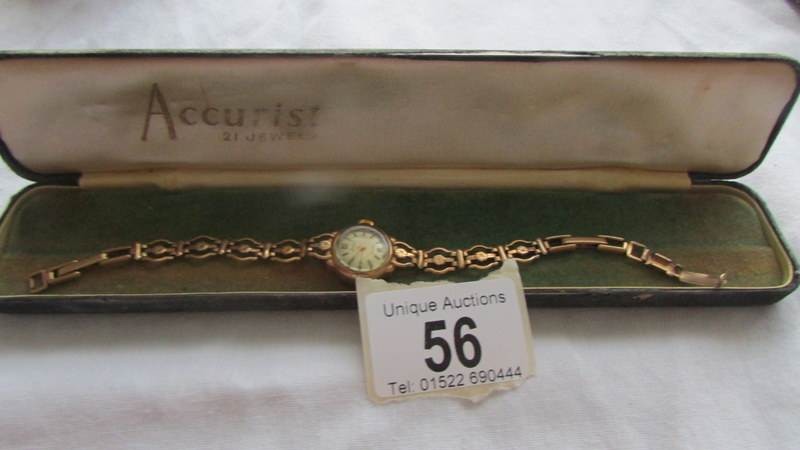 A 9ct gold Accurist ladies wrist watch. It winds and runs, Bracelet is hallmarked 9ct, Weight 11.5g