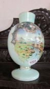 A Victorian hand painted glass vase.