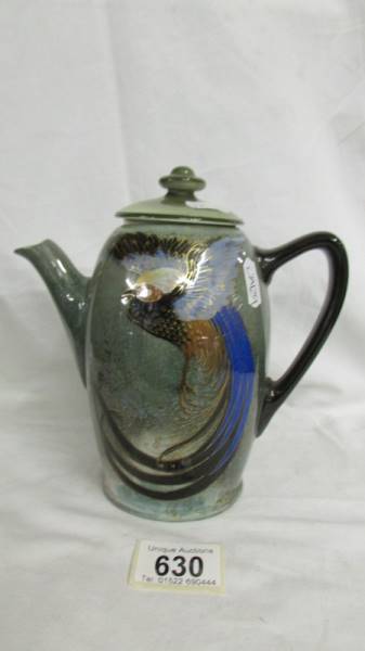 A Doulton 7" high Titanium coffee pot with a peacock design. (has lid but not matching).