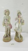 A pair of 19th century figurines, marked KPM with crossed swords. No damage of visible signs of