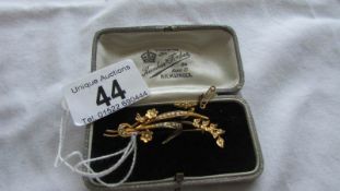A superb quality 9ct gold brooch set seed pearls.