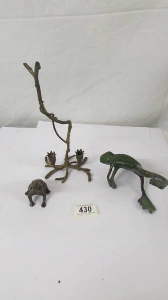 Two Japanese bronze frogs and a cold painted small twig centre piece.