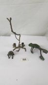 Two Japanese bronze frogs and a cold painted small twig centre piece.