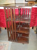 A mahogany revolving bookcase, label Goodyears London 1896-08, resister band. Collect only.