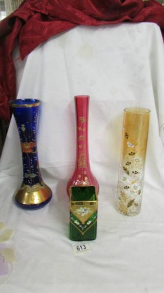 Four hand decorated glass vases. Collect only.