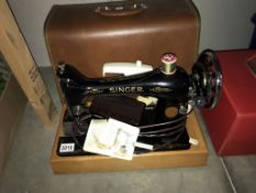 A Singer sewing machine. Collect only.