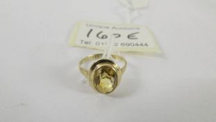 A 9ct gold ring set yellow set citrine, maker W & G, size L.