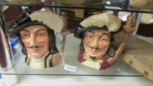 Two Royal Doulton character jugs, Porthos and Athos.