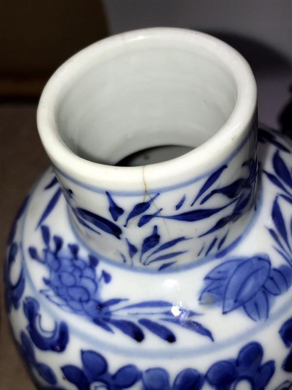 A pair of early Chinese blue and white lidded vases (both lids a/f) and a blue and white flask. - Image 19 of 25