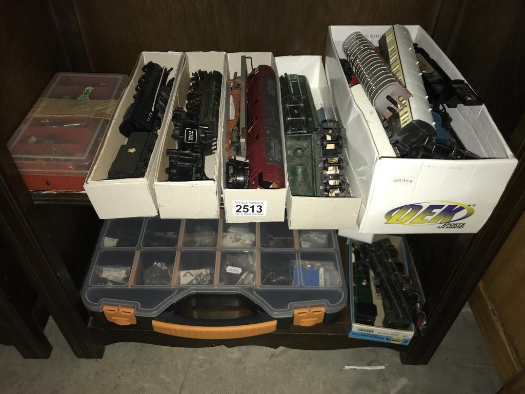 Repairable and spare model railway items (including 4 loco)( 2 shelves)