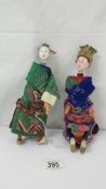 A pair of old Chinese dolls (Emporer and Empress).