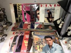 A good selection of vintage Elvis vinyl LP's & 45rpm records