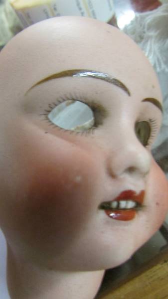 Three Victorian bisque porcelain dolls heads. - Image 6 of 7