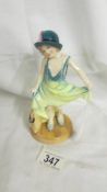 A limited edition Royal Doulton figurine "Dressing Up", HN3300, 544/9500.