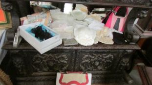 A good lot of vintage hats, purses and hand bags.