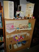 A large collection of Sindy furniture, shoes, and other accessories. COLLECT ONLY