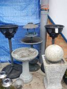 A Quantity of plastic & fibre glass garden ornaments - planters on stands, fountain, bird baths