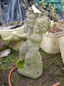 A concrete cherub fountain. 66 cm tall. Collect only.