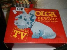 A rare boxed Paul O'grady nodding Olga dog.