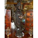 A large Japanese bronze figure signed on back, 81 cm tall (slight discolouration but otherwise in