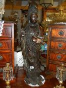 A large Japanese bronze figure signed on back, 81 cm tall (slight discolouration but otherwise in