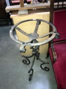 A wrought iron table base/ planter stand Height 73cm, top Diameter 45cm