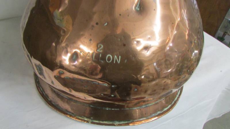 A large copper two gallon jug. Collect only. - Image 2 of 3