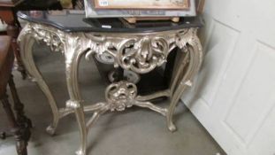 A console table with marble top.
