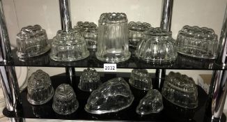 14 vintage glass jelly moulds. Collect only.