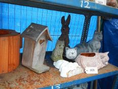 A quantity of cat garden ornaments, bird box and water can planter. Collect only.