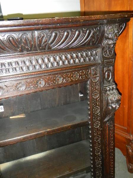 A good heavily carved glazed door book case, - Image 2 of 2