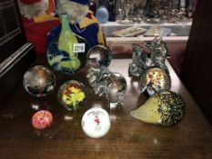 A Quantity of glass paperweights including Caithness.