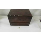 A Victorian Ladies Amboyna jewellery box/writing box. Some veneer loss to sides & around hinge on