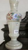 A Victorian hand painted glass vase.