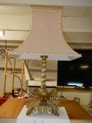 A mid 20th century table lamp with eagle base.