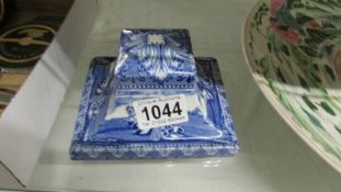 A blue and white china inkwell.