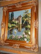 A gilt framed needlework castle scene. 87 x 76 cm. (collect only).