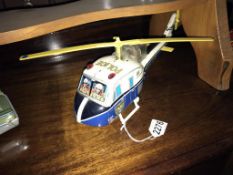 A Japanese 'T N' tin plate Nomura battery operated police helicopter (working)