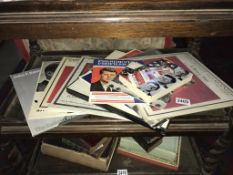An assortment of Kennedy related LP's and books