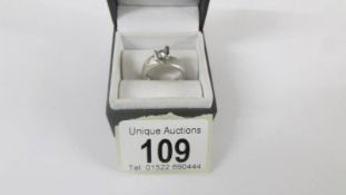 A 14 ct white gold 5.7 gram solitaire ring. Size N.