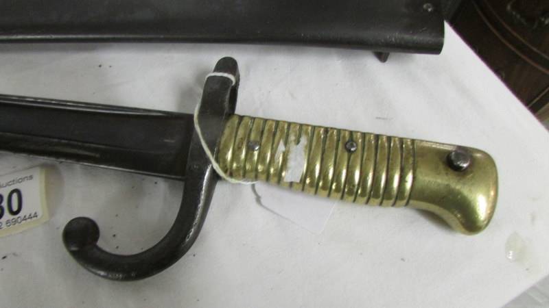 An old bayonet in sheath. - Image 2 of 10