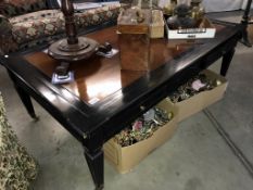 A large 4 drawer coffee table