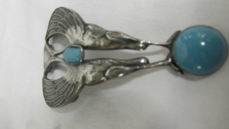 An arts and crafts white metal belt buckle with turquoise stones in the form of a styalised bird. - Image 4 of 12