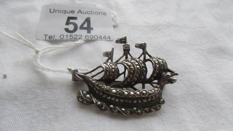 A silver marcasite brooch as a viking ship.